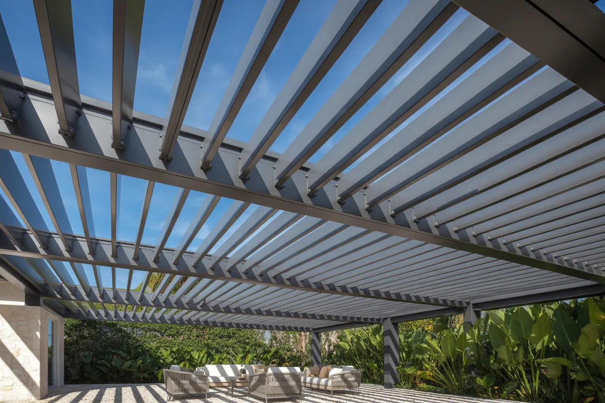 Aluminum pergola with retractable canopy at pool edge in Venice, FL